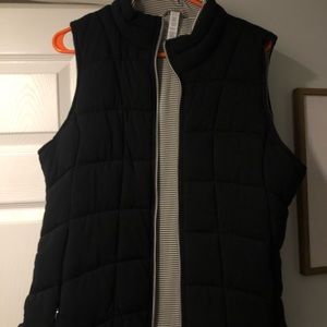 Soft, black zip up vest